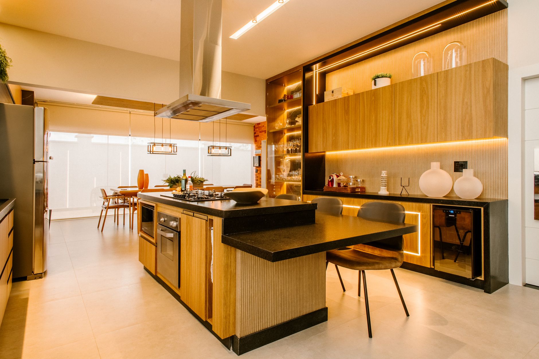 Elegant kitchen interior featuring wooden cabinets, island, and modern lighting in Austin, TX